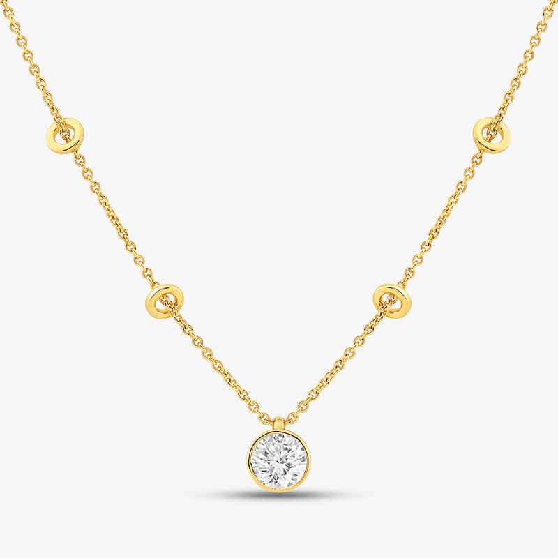 The Minimal Charm Diamond Necklet by Keemti Jewels features bezel-set diamonds and a solitaire drop pendant.