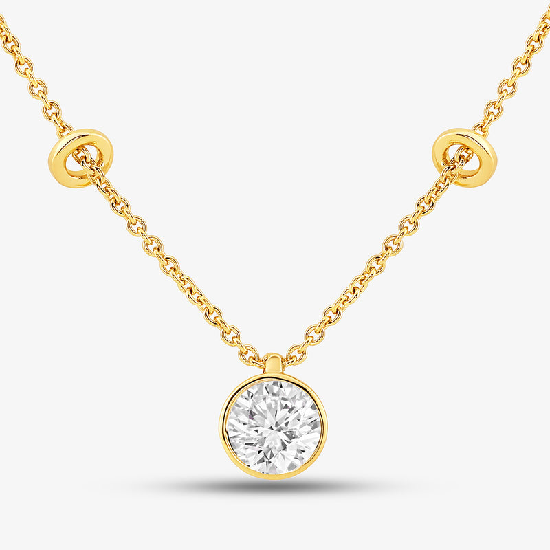 Keemti Jewels' Minimal Charm Diamond Necklet features bezel-set diamonds with gold ring accents.