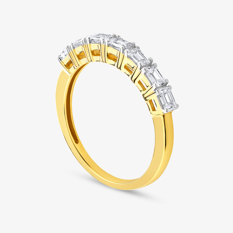 The Lucent Emerald Cut Diamond Band by Keemti Jewels features baguette diamonds set in a gold band, angled side view.