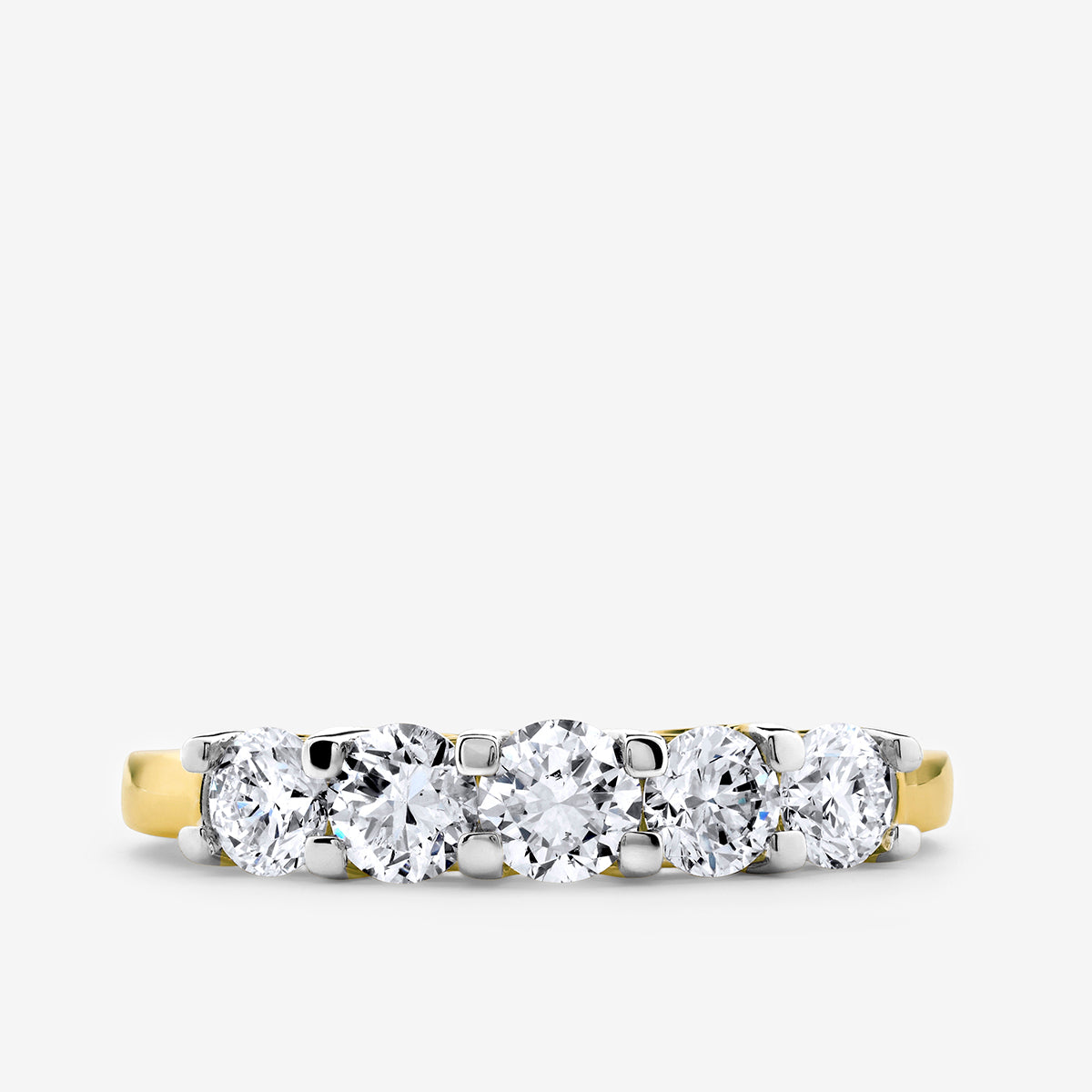 The CROWN Arc Solitaire RING by Keemti Jewels features a gold crown silhouette with five round diamonds on a plain band.