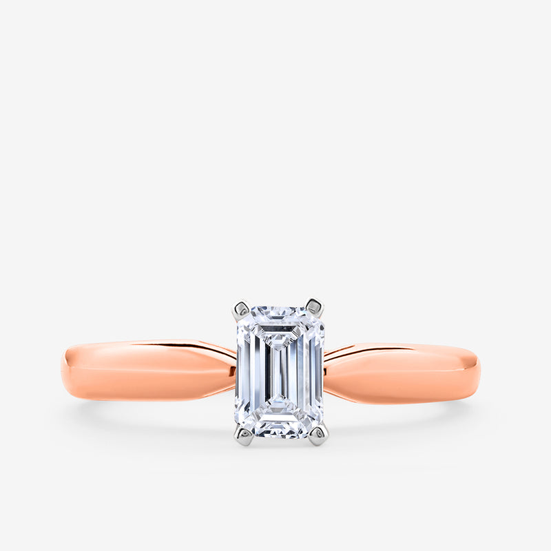 Minimal Emerald Solitaire Ring