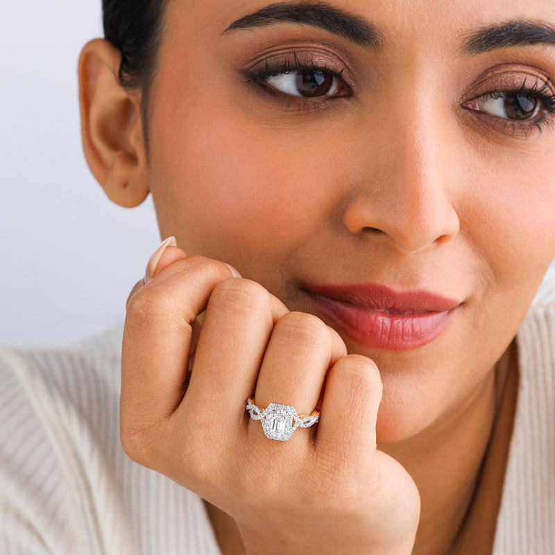 Woman smiles, displaying the Keemti Jewels Halo Of Roselight Diamond Bridal Ring with a sparkling blush halo.