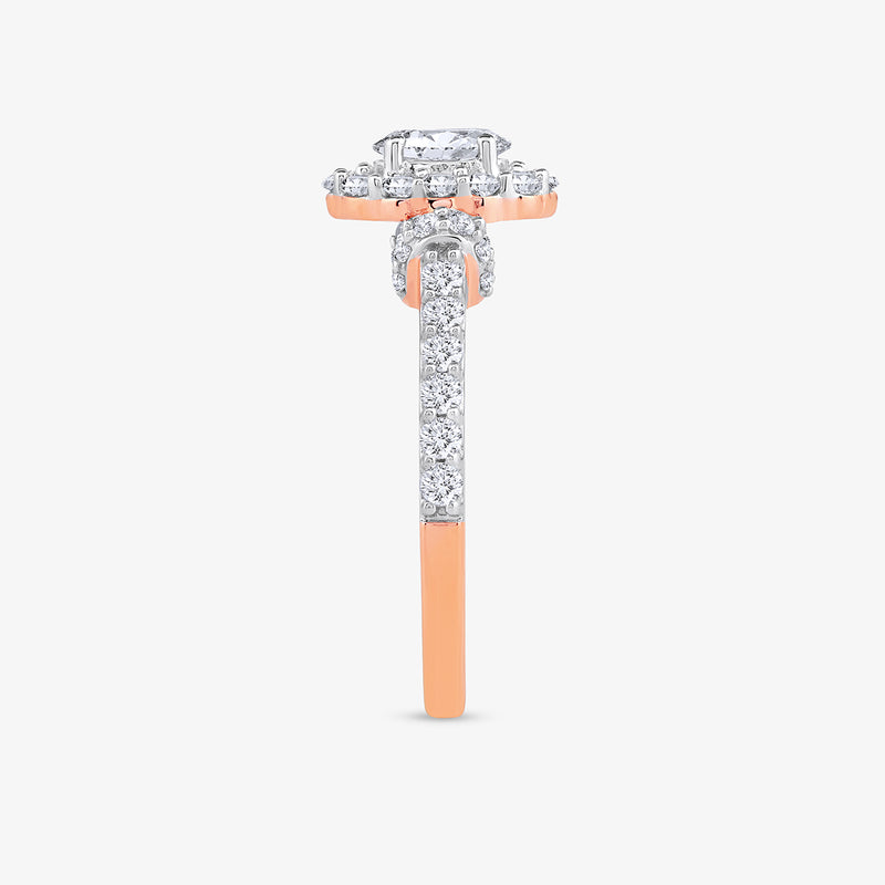 The Petal Glow Diamond Promise Ring by Keemti Jewels features an oval halo and diamond band in romantic rose gold.