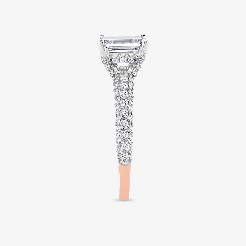 Side view of the Timeless Emerald Solitaire Ring by Keemti Jewels, featuring a rose gold band and large rectangular stone.