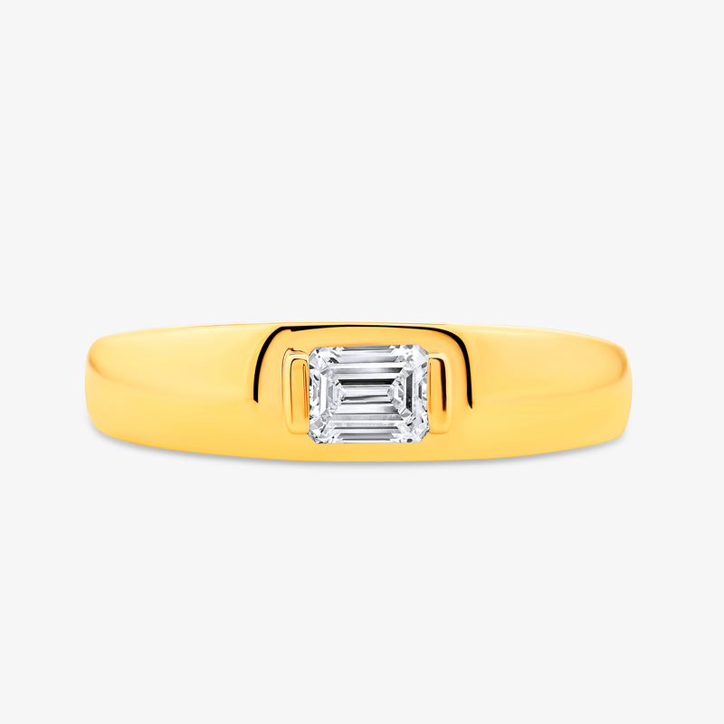 The Classic Solitaire Mens Ring by Keemti Jewels features a gold band and emerald-cut diamond, set on a white background.