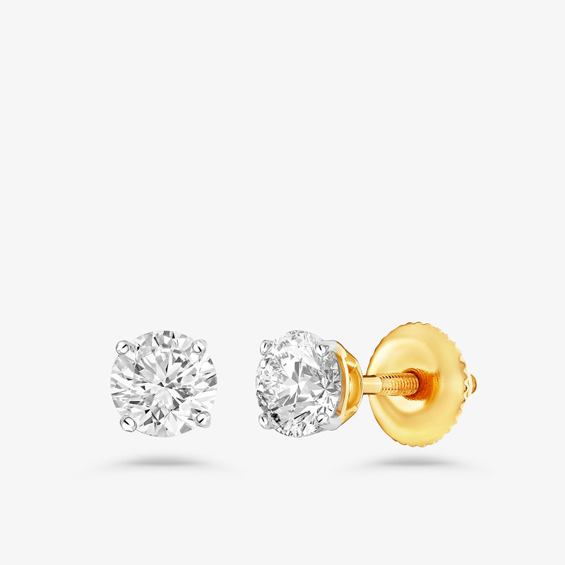 TIMELESS Solitaire Stud Earrings by Keemti Jewels feature round stones in gold prong settings with screw-back closures.