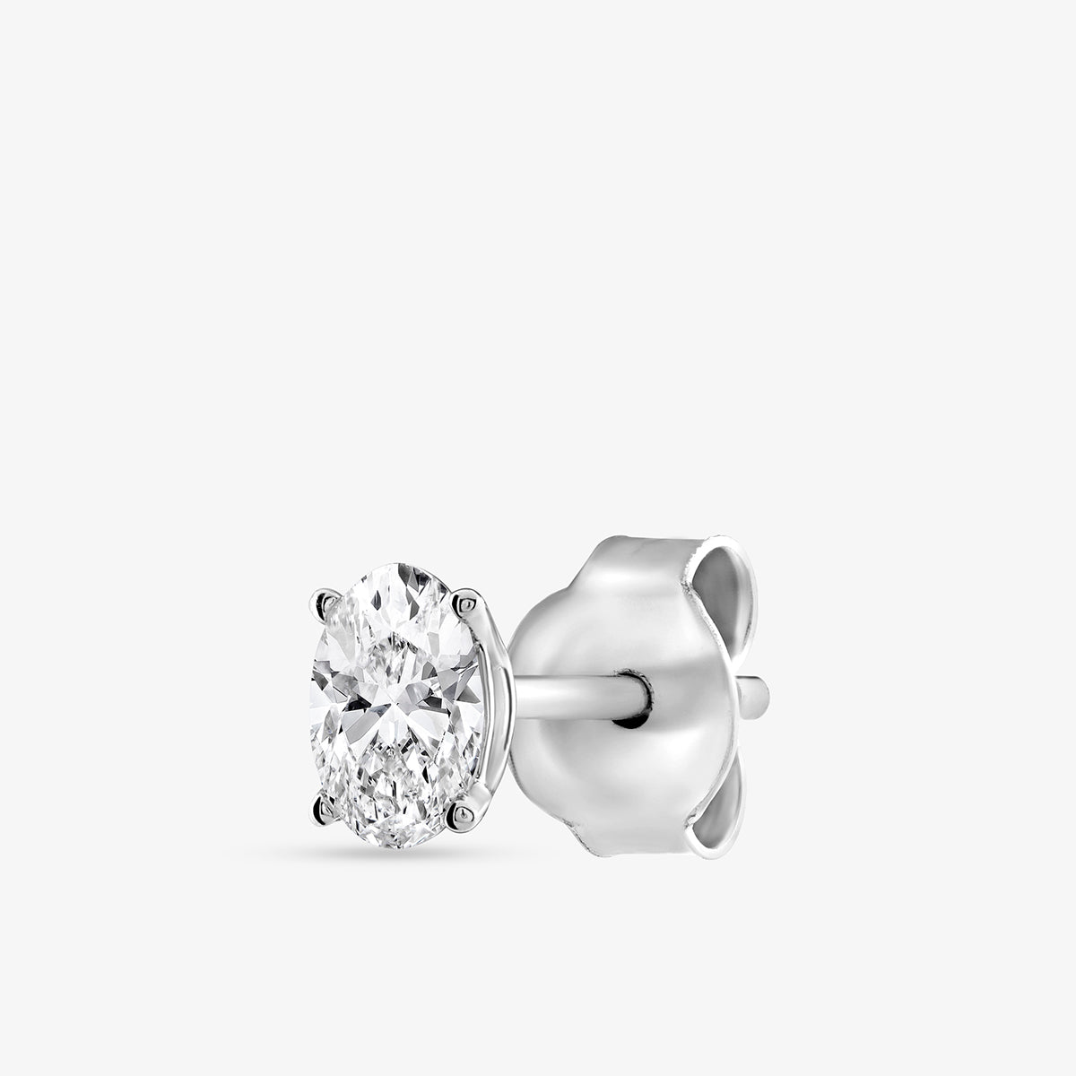 Keemti Jewels TIMELESS Oval Solitaire Stud Earrings in silver, elegant jewelry shown on a plain white background.
