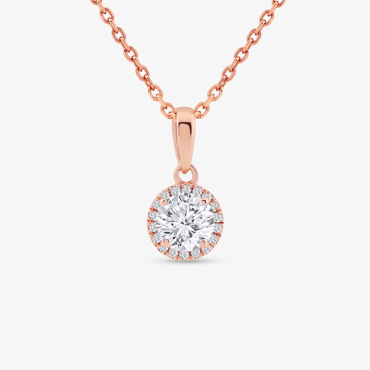 The AURELIA Round Halo Necklet by Keemti Jewels adds everyday elegance with its diamond center and rose gold finish.