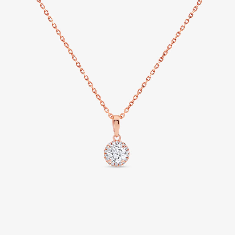 The AURELIA Round Halo NECKLET by Keemti Jewels adds everyday elegance with its rose gold chain and halo pendant.